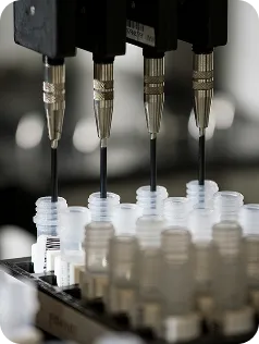 Automated pipette dispensing samples into vials